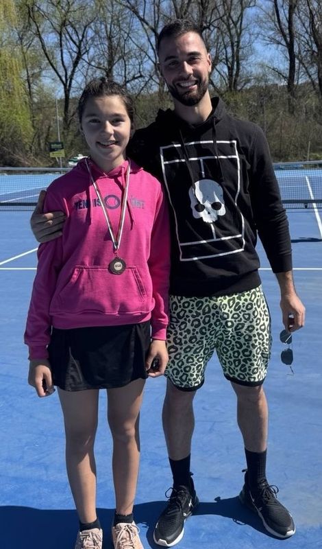 With coach Vladislav Karazhov